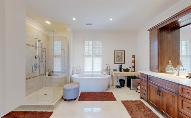 941 Champney, Saint Simons Island, GA 31522 - bathroom featuring vanity, a freestanding tub, a stall shower, recessed lighting, and crown molding