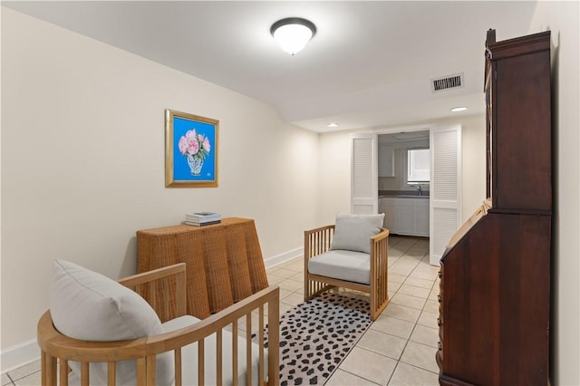 662 N Golf Villas Dr, Saint Simons Island, GA 31522 - living area with light tile patterned floors, baseboards, and recessed lighting