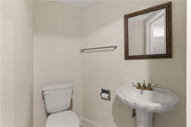 662 N Golf Villas Dr, Saint Simons Island, GA 31522 - half bath with toilet and baseboards