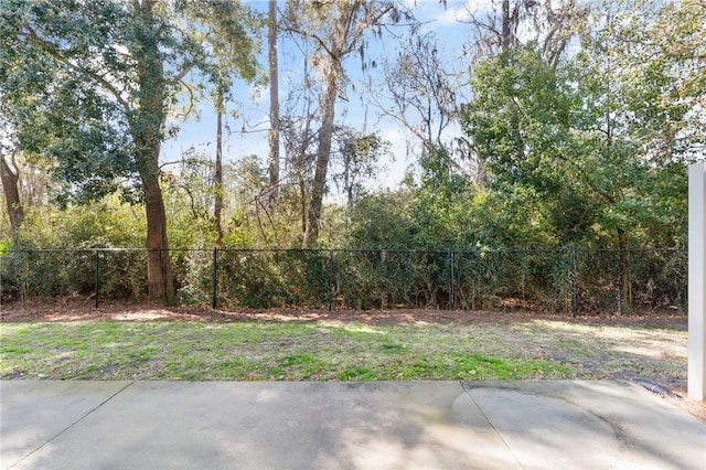 view of yard with a patio and fence