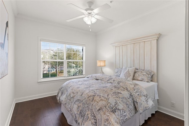 bedroom with dark wood-type flooring, baseboards, and ornamental molding