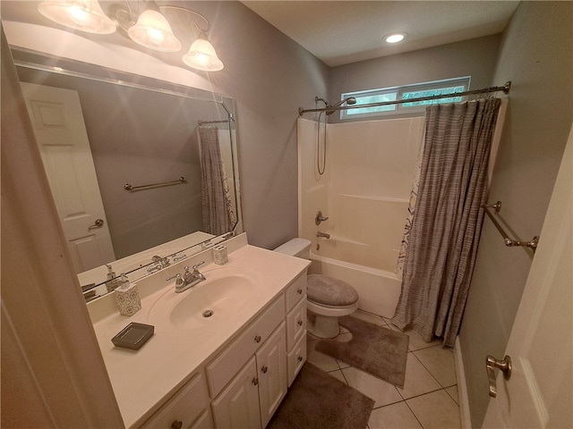 1002 Baltimore Ave, Waycross, GA 31501 - full bathroom featuring vanity, shower / bath combo, toilet, and tile patterned flooring