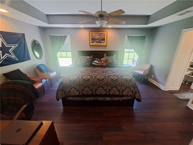 1002 Baltimore Ave, Waycross, GA 31501 - bedroom featuring wood finished floors, baseboards, multiple windows, ceiling fan, and recessed lighting