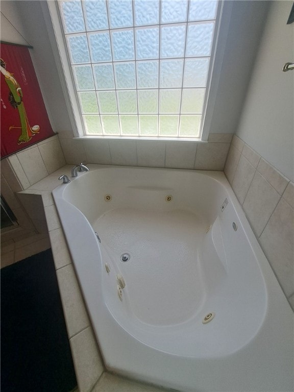 1002 Baltimore Ave, Waycross, GA 31501 - bathroom featuring a tub with jets