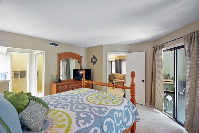 874 Wimbledon Dr, Saint Simons Island, GA 31522 - bedroom with light carpet and access to outside