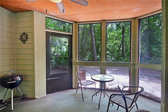 874 Wimbledon Dr, Saint Simons Island, GA 31522 - sunroom with ceiling fan, carpet, and wooden ceiling