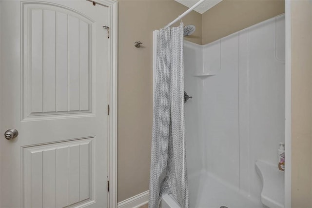 bathroom featuring a stall shower