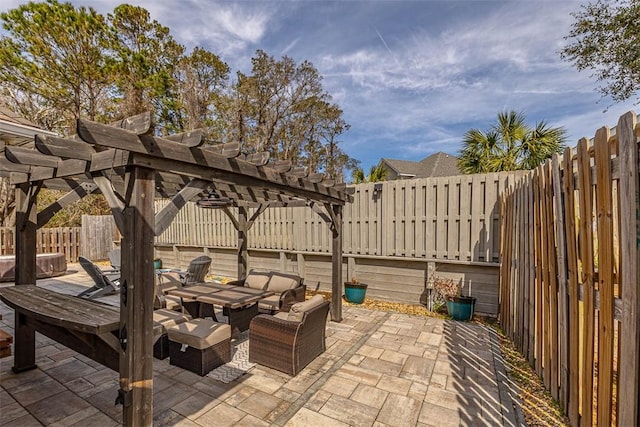 view of patio / terrace featuring outdoor dining space, a fenced backyard, and a pergola