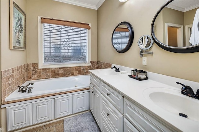 full bathroom featuring crown molding, a garden tub, a sink, and double vanity