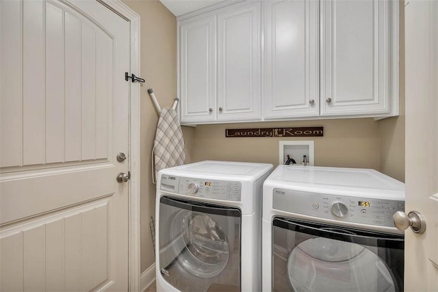 laundry area with cabinet space and washer and dryer