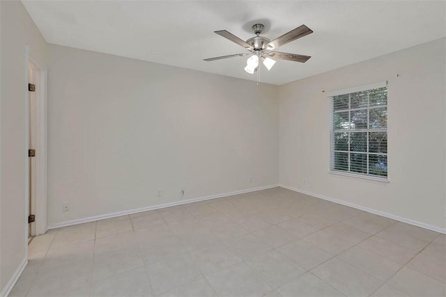 239 Georgia St, Saint Simons Island, GA 31522 - empty room with ceiling fan and baseboards