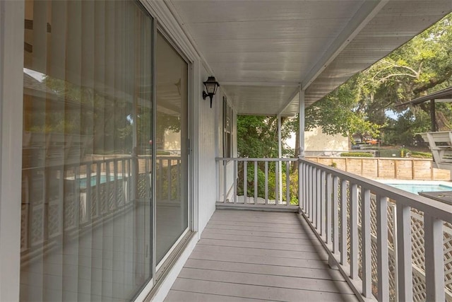 239 Georgia St, Saint Simons Island, GA 31522 - covered porch featuring view of pool
