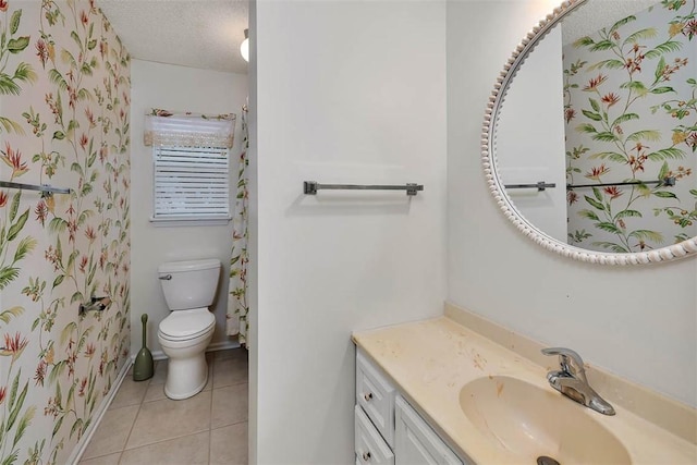 239 Georgia St, Saint Simons Island, GA 31522 - full bath featuring vanity, tile patterned floors, and a textured ceiling