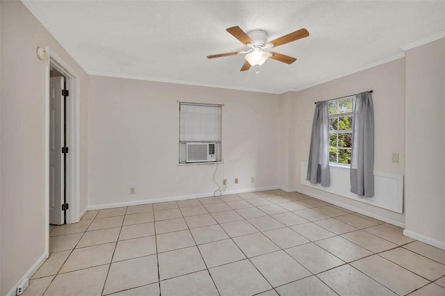 239 Georgia St, Saint Simons Island, GA 31522 - unfurnished room featuring cooling unit, ceiling fan, light tile patterned floors, and crown molding