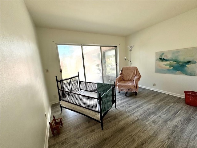 bedroom featuring dark hardwood / wood-style floors