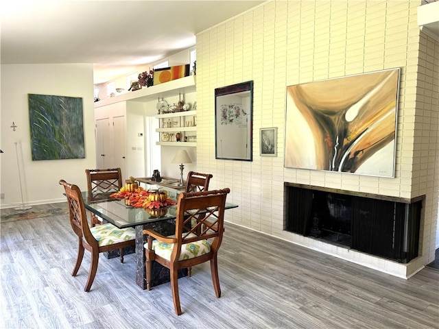 dining space with dark wood-type flooring