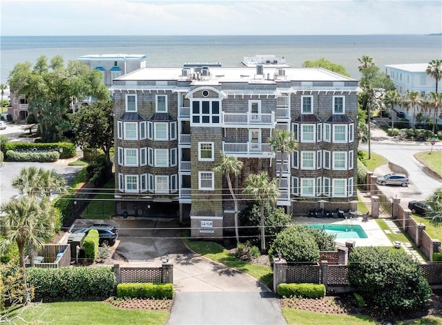 birds eye view of property featuring a water view