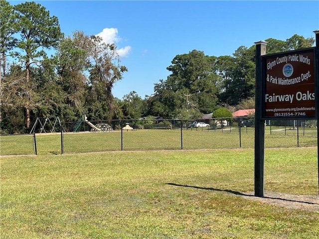 view of home's community featuring a yard