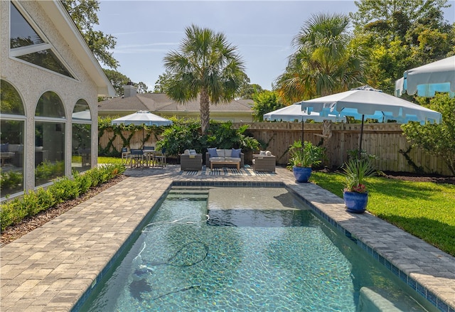 122 Saint Andrews Dr, Saint Simons Island, GA 31522 - view of swimming pool featuring an outdoor living space and a patio