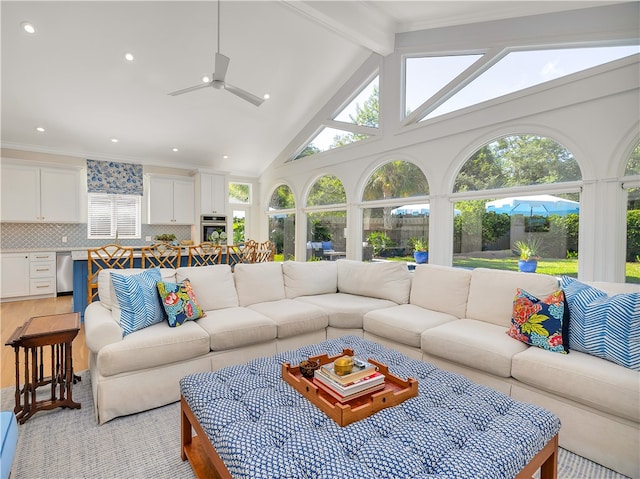 122 Saint Andrews Dr, Saint Simons Island, GA 31522 - living room featuring a ceiling fan, high vaulted ceiling, and beamed ceiling