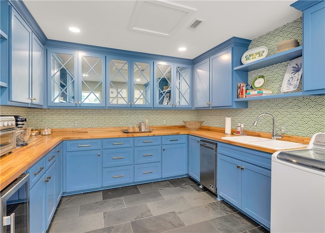 122 Saint Andrews Dr, Saint Simons Island, GA 31522 - kitchen with wooden counters, wine cooler, blue cabinets, and recessed lighting