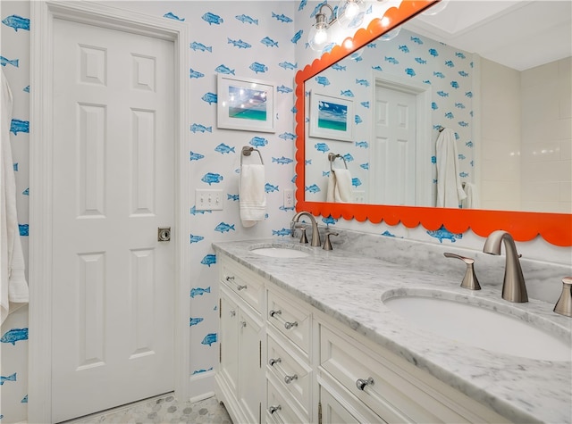 122 Saint Andrews Dr, Saint Simons Island, GA 31522 - bathroom with wallpapered walls and double vanity