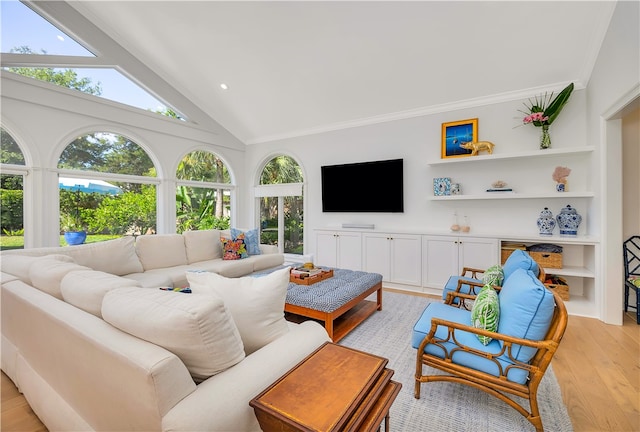 122 Saint Andrews Dr, Saint Simons Island, GA 31522 - living room with light wood-style flooring, plenty of natural light, high vaulted ceiling, ornamental molding, and recessed lighting