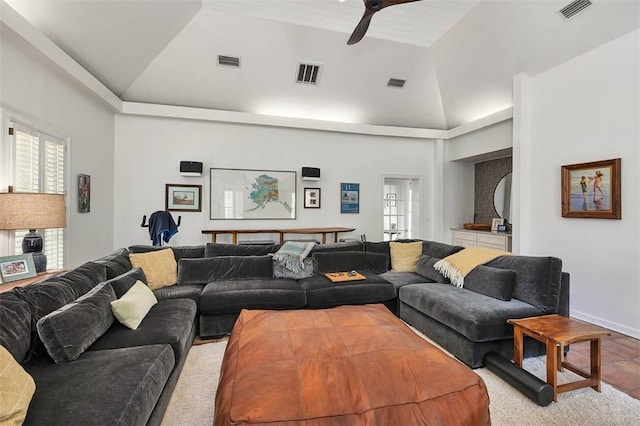 living area featuring a wealth of natural light and visible vents