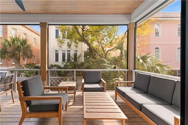 sunroom / solarium with a wealth of natural light and wooden ceiling