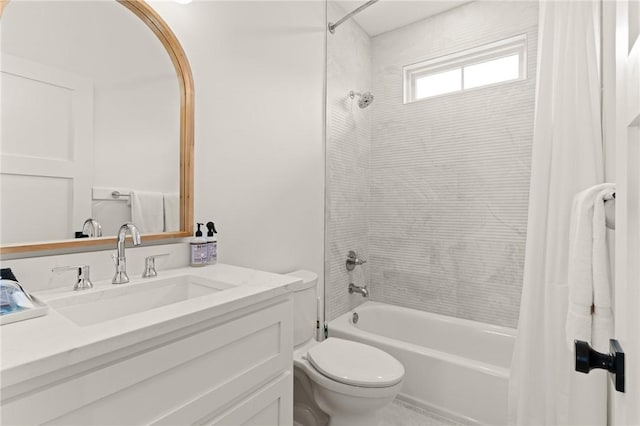 full bathroom featuring vanity, toilet, and shower / bath combo with shower curtain