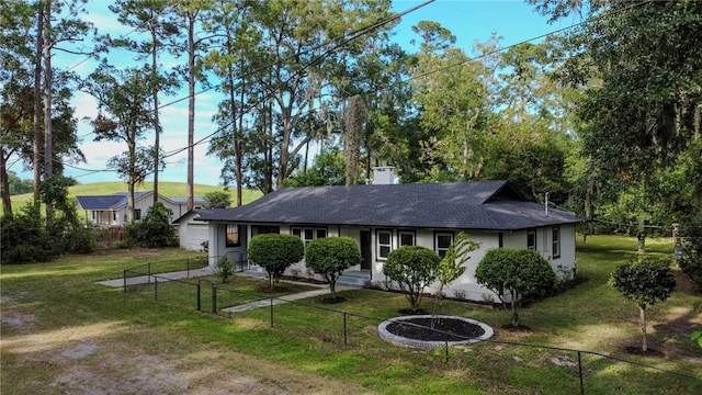 4166 Southern Rd, Brunswick, GA 31520 - single story home with a shingled roof, a chimney, and a garage