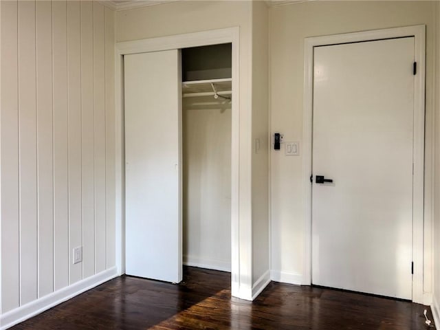 4166 Southern Rd, Brunswick, GA 31520 - unfurnished bedroom with dark wood-type flooring and a closet