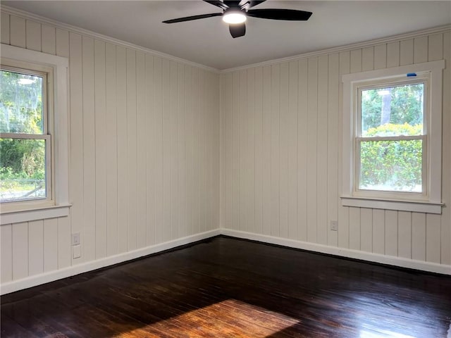 4166 Southern Rd, Brunswick, GA 31520 - empty room with dark wood-type flooring, a ceiling fan, and crown molding