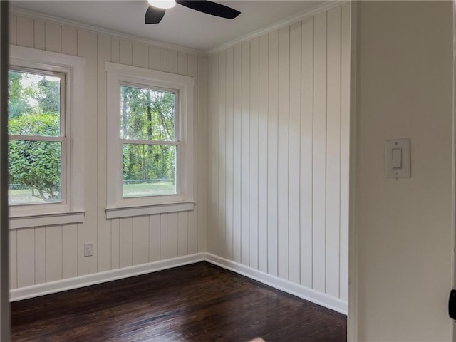 4166 Southern Rd, Brunswick, GA 31520 - empty room with dark wood-type flooring, ornamental molding, and ceiling fan