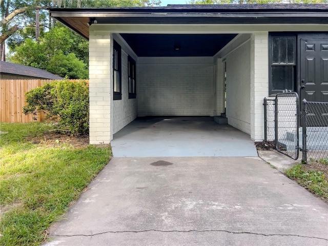 4166 Southern Rd, Brunswick, GA 31520 - view of parking / parking lot with a carport and driveway
