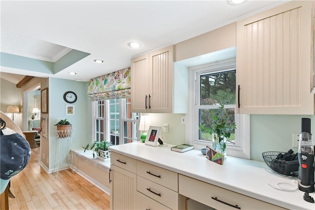 502 Rivera Dr, Saint Simons Island, GA 31522 - kitchen featuring ornamental molding, light wood-style floors, light countertops, recessed lighting, and baseboards