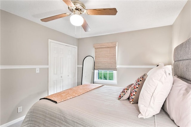 502 Rivera Dr, Saint Simons Island, GA 31522 - bedroom with a closet, ceiling fan, and baseboards