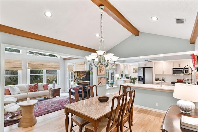502 Rivera Dr, Saint Simons Island, GA 31522 - dining space with beam ceiling, light wood-style floors, a chandelier, recessed lighting, and high vaulted ceiling
