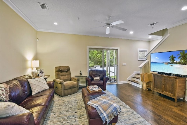 living room with ceiling fan, dark hardwood / wood-style floors, and ornamental molding