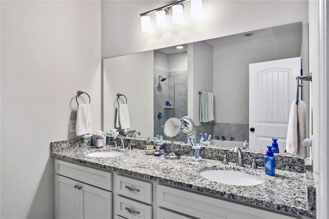 bathroom featuring vanity and separate shower and tub