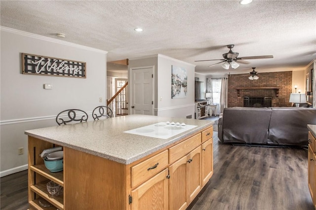 265 Traders Hill Rd, Folkston, GA 31537 - kitchen featuring a textured ceiling, dark wood-type flooring, and white electric stovetop
