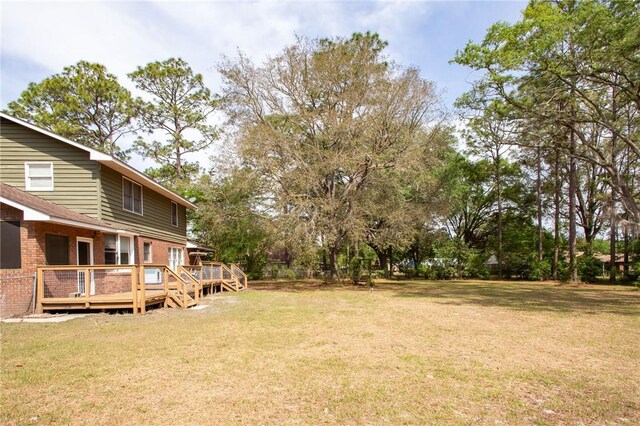 265 Traders Hill Rd, Folkston, GA 31537 - view of yard with a wooden deck