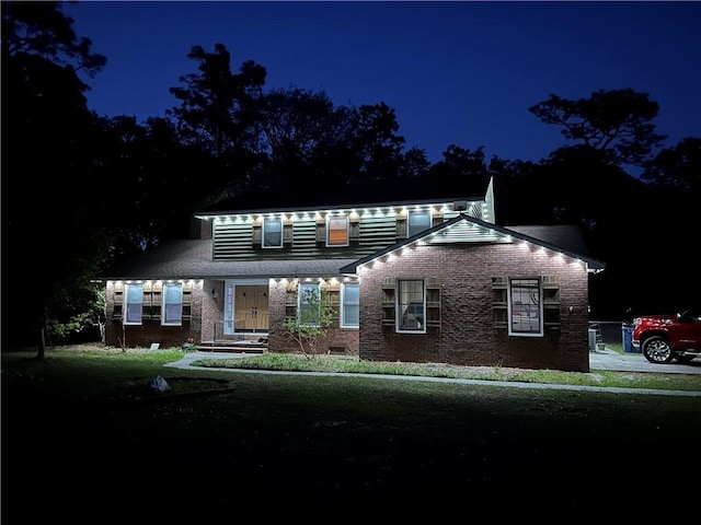 265 Traders Hill Rd, Folkston, GA 31537 - traditional-style home with a yard and brick siding