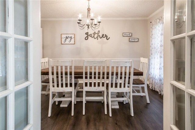 265 Traders Hill Rd, Folkston, GA 31537 - dining space featuring an inviting chandelier, crown molding, and wood finished floors