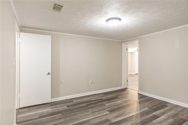 1348 Crestridge Rd, Waycross, GA 31503 - empty room with wood finished floors, a textured ceiling, and crown molding
