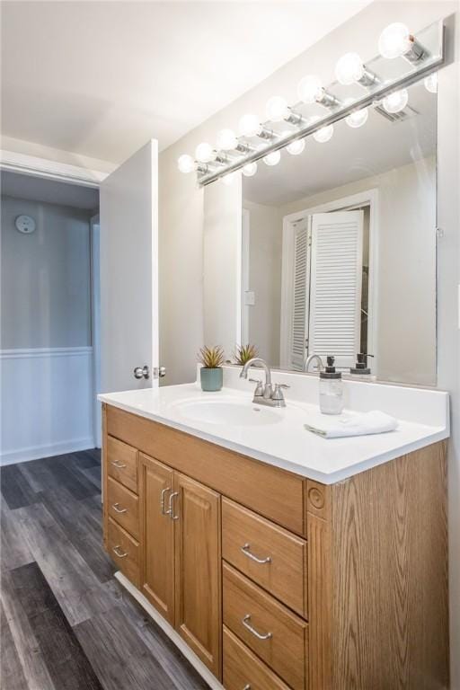 1348 Crestridge Rd, Waycross, GA 31503 - bathroom with vanity and wood finished floors