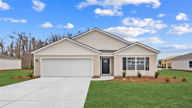 ranch-style home featuring a garage and a front yard