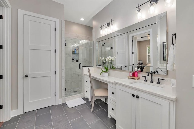 121 Calwell St, Saint Simons Island, GA 31522 - full bath featuring vanity, a marble finish shower, tile patterned floors, and recessed lighting