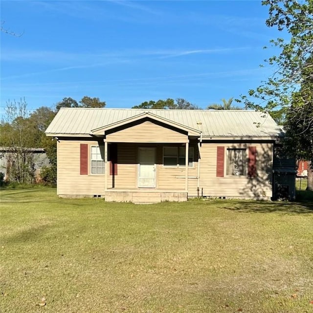 1110 Waller St, Waycross, GA 31501 - view of front facade with a front yard, crawl space, and metal roof