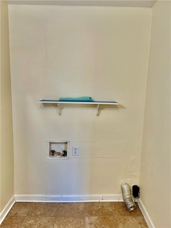 1110 Waller St, Waycross, GA 31501 - clothes washing area featuring baseboards, washer hookup, and laundry area